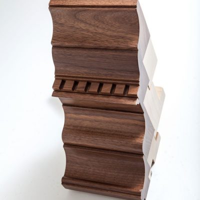 Sample section of dentil cornice in polished walnut